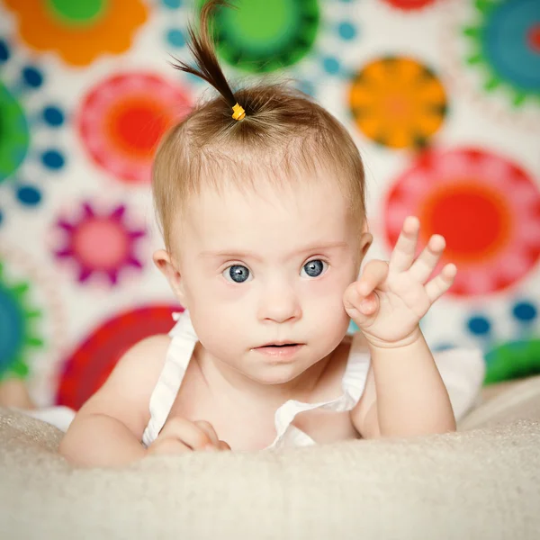 Little girl with Down syndrome — Stock Photo, Image
