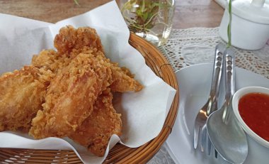 deep fried breaded crispy chicken wing with dipping sauce