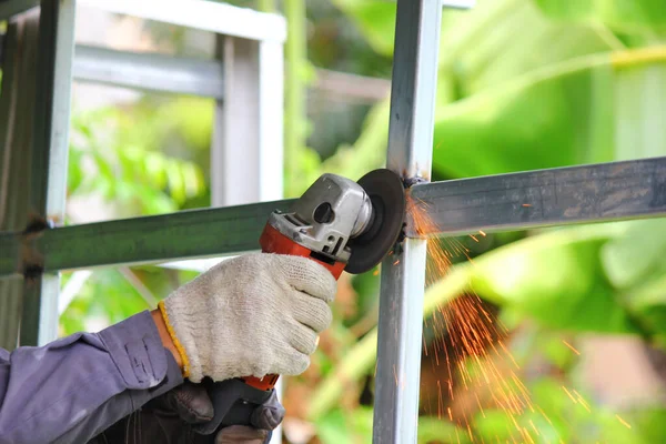 Close Worker Using Angle Grinder Polishing Steel Structure Yellow Sparks —  Fotos de Stock