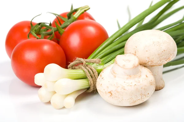 Tomaten, groene ui en champignons — Stockfoto