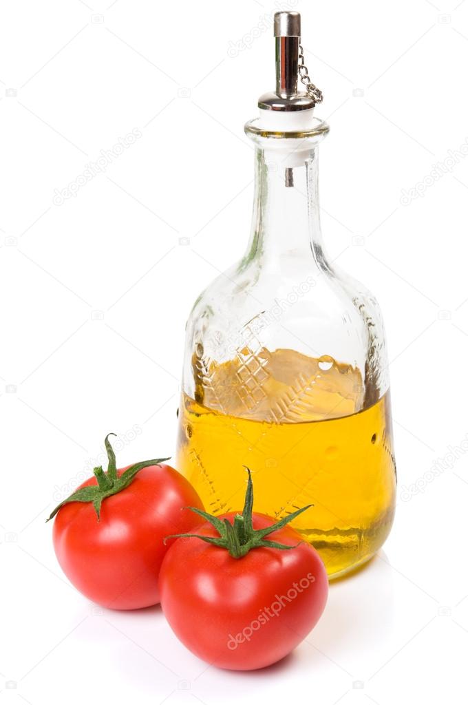 Tomatoes and olive oil isolated