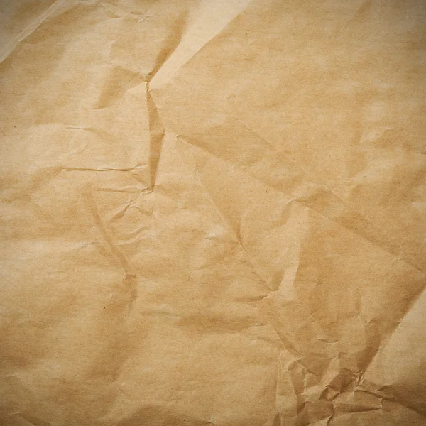 Crumpled paper background vignette — Stock Photo, Image