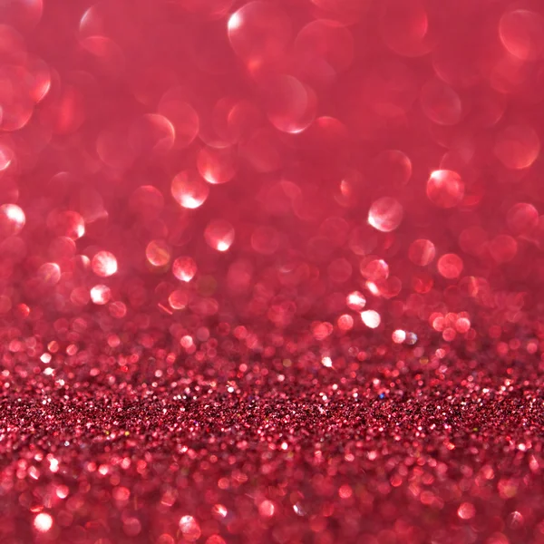 Unfocused abstract red glitter holiday background — Stock Photo, Image