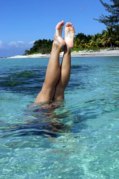 Hand stand in sea — Stock Photo, Image