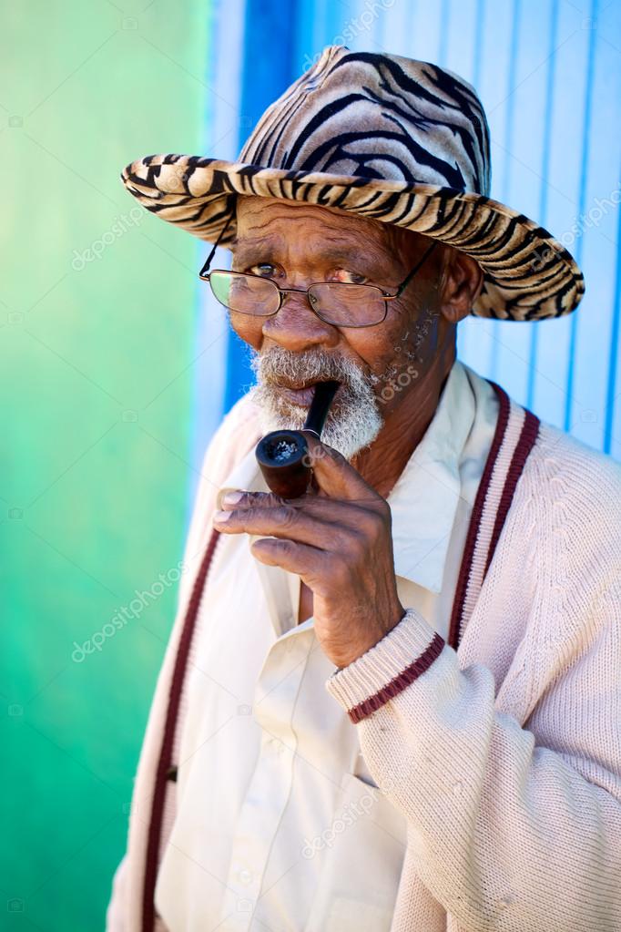 Old african male smoking — Stock Photo © noltelourens #25914223