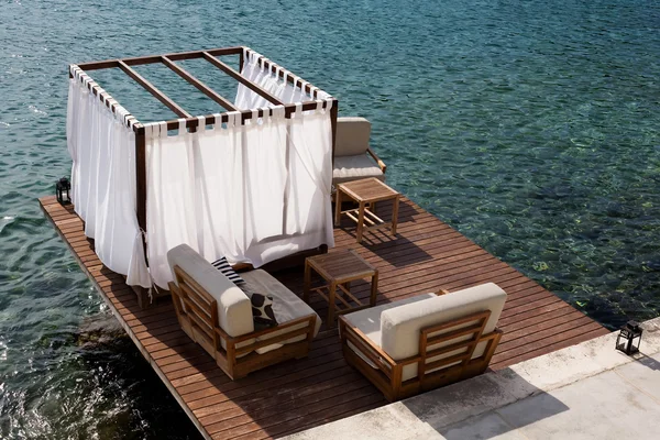 Bed by the water — Stock Photo, Image