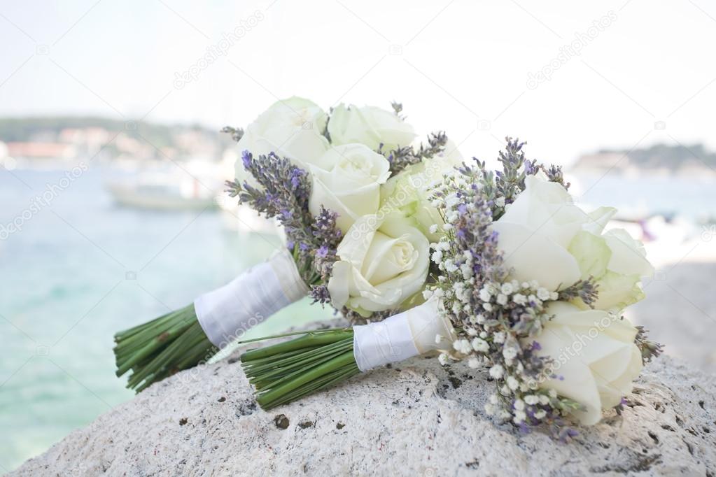 White roses on a rock