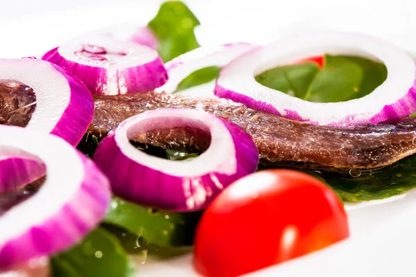 Onions and anchovies — Stock Photo, Image