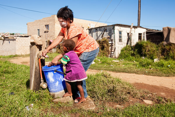 mother cleaning daughter