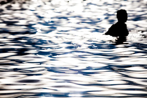 Silhouette in ripples — Stock Photo, Image