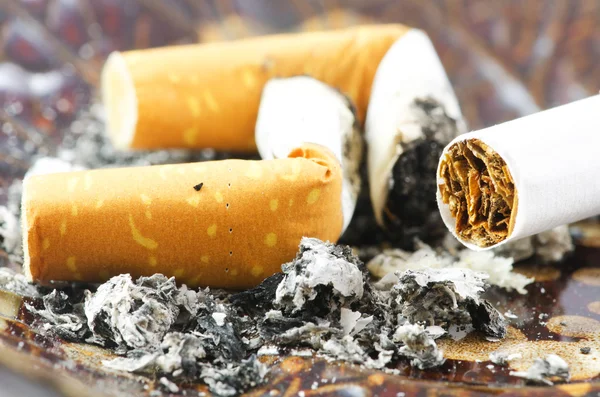 Cigarette buds and cigarette — Stock Photo, Image