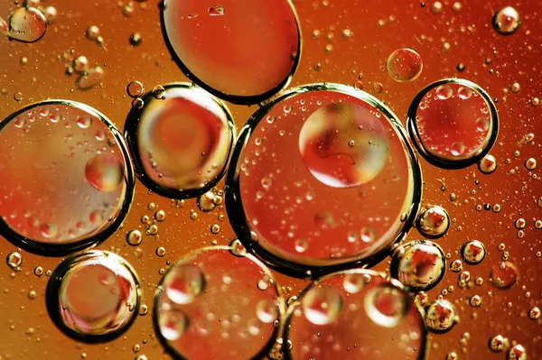 Oil drops on water. — Stock Photo, Image