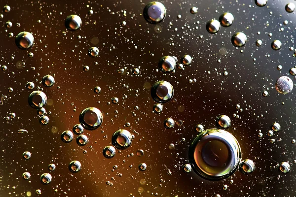 Oil drops on water. — Stock Photo, Image