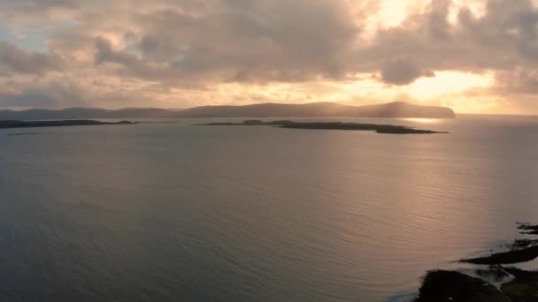 Beautiful aerial view of Isle of Skye coast at sunset with godrays — стокове відео