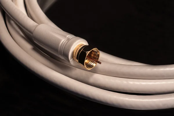 White Coax cable for satelite, cable video audio connections — Stock Photo, Image