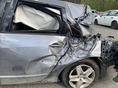 Burnt and blown up car. Cars damaged after shelling. Traces of shots on the body of the car. War between Russia and Ukraine, Irpin-Bucha, April 10, 2022