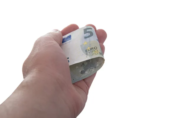 Mano tiene un nuevo billete de 5 euros Imagen de stock