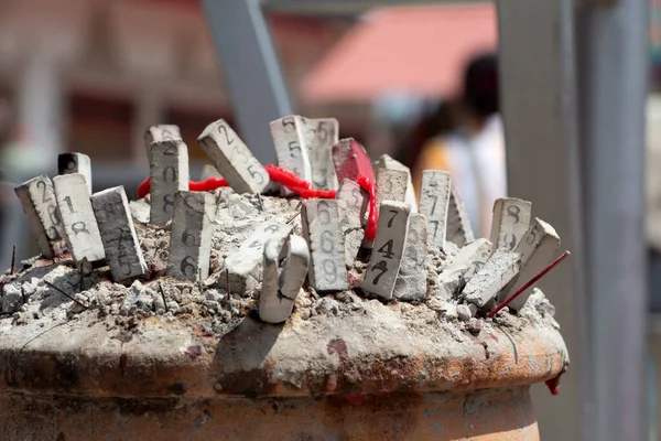 The numbers on the incense sticks dotted on the incense burner It is a gamble that Thai people have played for a long time. Lucky number for lotto or Thai lottery