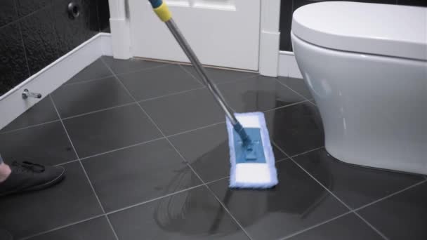 Housewife Washes Tiled Floor Bathroom Detergents Mop — Stock Video