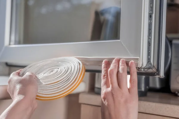 Housewife Sticks Sealing Rubber Strip Window Her House — Stock Photo, Image
