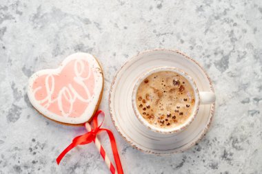 coffee cup and tasty shaped cookies. valentine's day