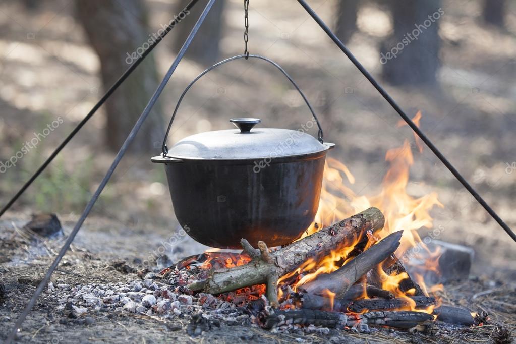 Cooking in the forest. — Stock Photo © svetlanka7777 34587223
