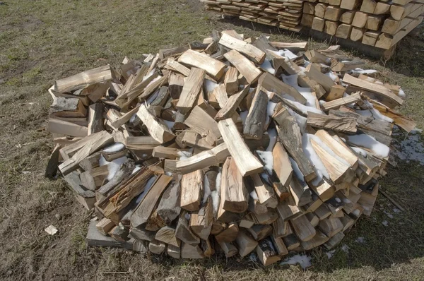 Firewood stacked in winter. — Stock Photo, Image