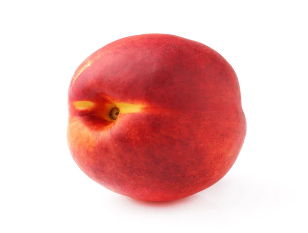 Один спелый персик — стоковое фото
