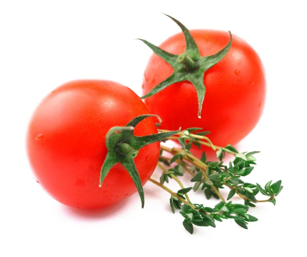 Ripe tomatoes and thyme. — Stock Photo, Image