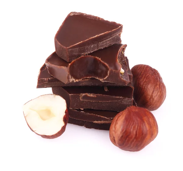 Chocolate with nuts on white. — Stock Photo, Image
