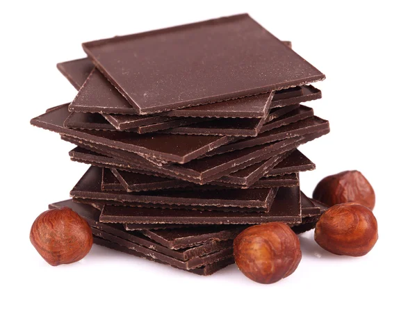 Chocolate with nuts on white. — Stock Photo, Image