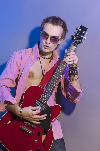 Portrait of the Man with the Guitar