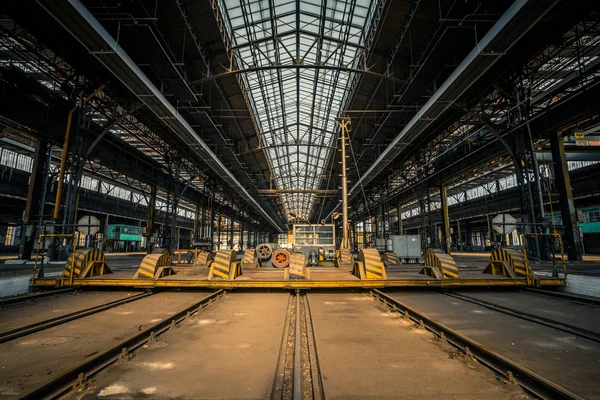 Abandoned industrial interior with bright light — Stock Photo, Image