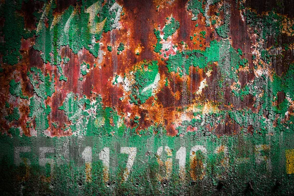 Pintura verde placa de metal enferrujado — Fotografia de Stock