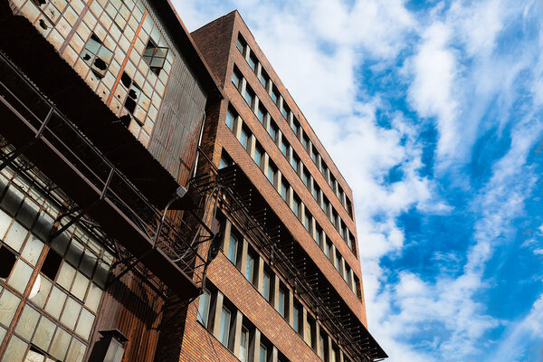 An old ruined metallurgical firm's exterior facade — Stock Photo, Image