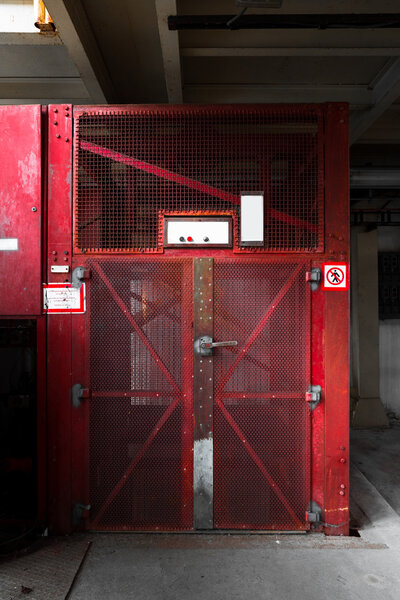 Old industrial building in the freight elevator Royalty Free Stock Images