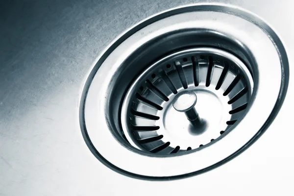 A stainless steel kitchen sink drain — Stock Photo, Image