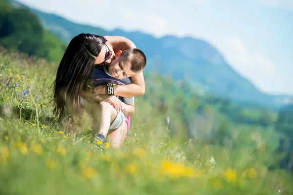 Mother kissing her child on the cheek — Stock Photo, Image