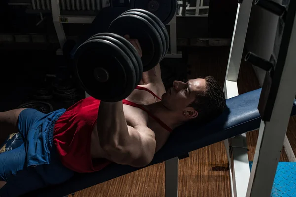 Young bodybuilder doing bench press for chest — Stock Photo, Image