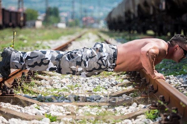 Muscular Man Doing Push-ups