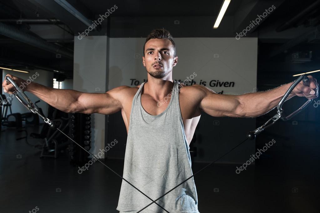 Shoulders Cable Lateral Raise Workout Stock Photo by ibrak 36045961