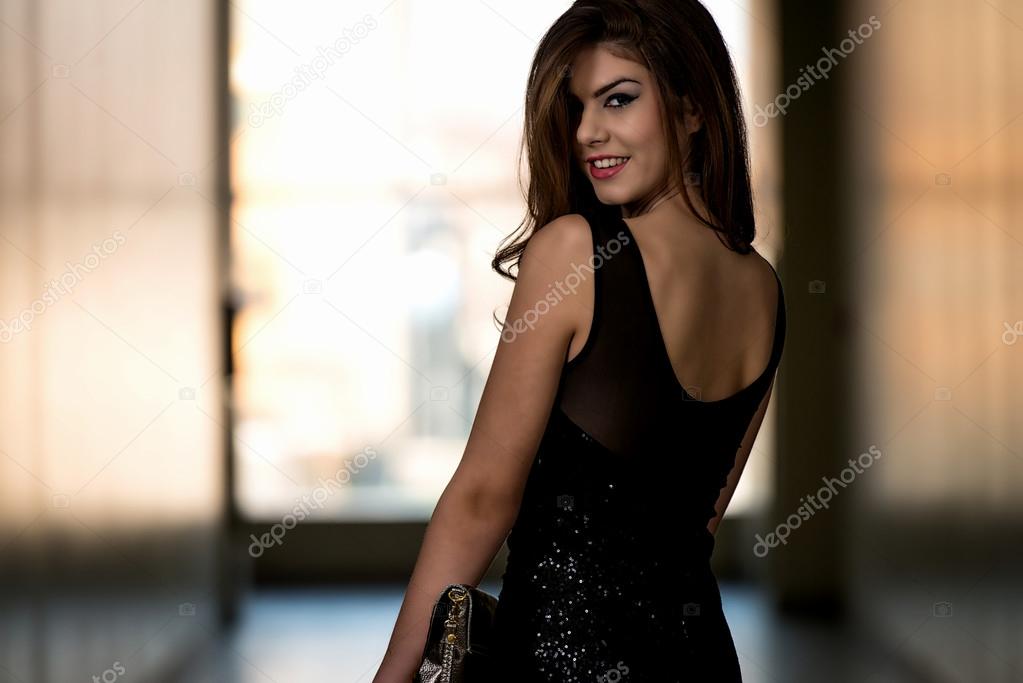 Fashion Model From Behind In Beautiful Black Dress