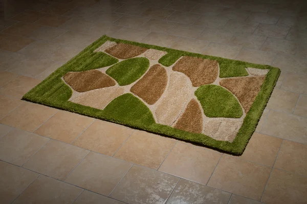 Single Green Carpet Folded On Floor — Stock Photo, Image