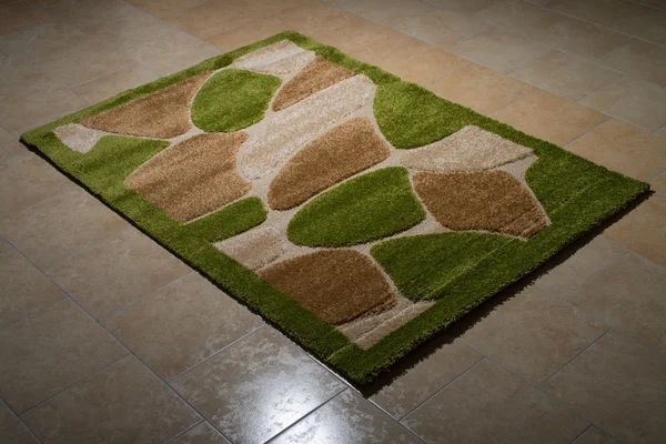 Single Green Carpet Folded On Floor — Stock Photo, Image