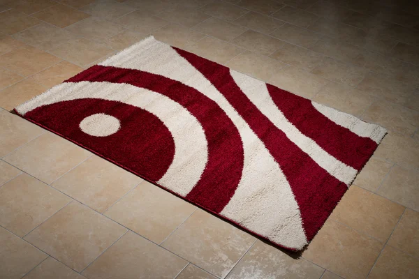 Single Red Carpet Folded On Floor — Stock Photo, Image