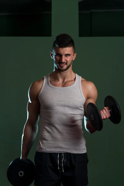 Muscular Man Exercising Biceps — Stock Photo, Image