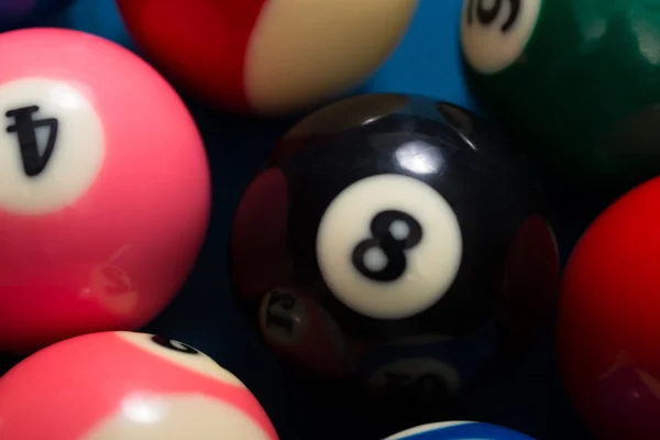 Close-Up Of Pool Balls On Blue Pool Table