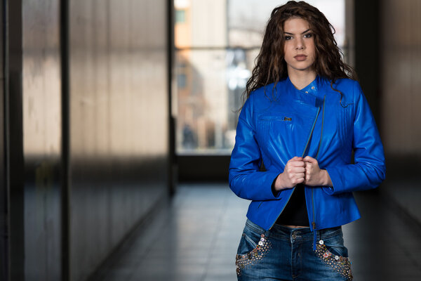 Glamour Fashion Model Wearing Blue Leather Jacket