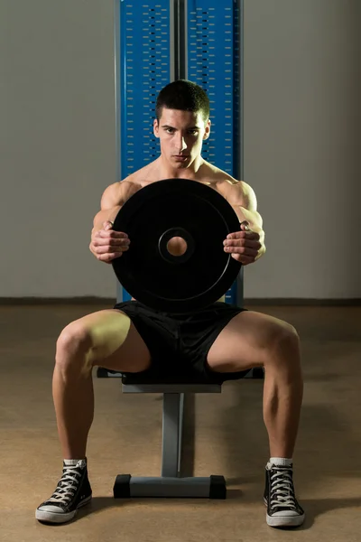 Exercise For Shoulders Front Plate Raise — Stock Photo, Image