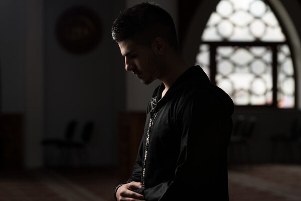 Young Muslim Guy Praying